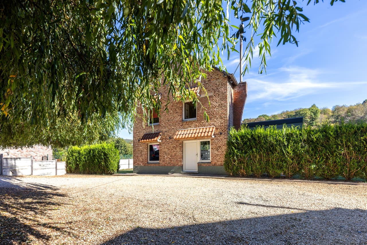 Brick front under the weeping willow
